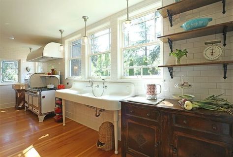 An antique window, range, sink, cabinet and the salvaged Fir floor make the kitchen feel homey. 1920 Kitchen, Mudroom Addition, Shiplap Paneling, Unfitted Kitchen, 1920s Bungalow, Antique Window, Recessed Medicine Cabinet, 1920s House, Faux Fireplace