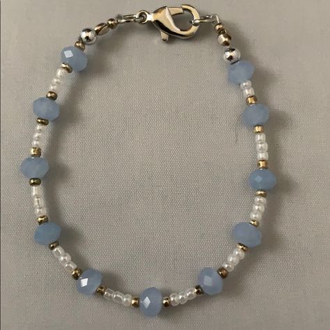 Handmade By Me, A Blue, White And Gold Small Bead Bracelet Accented In Silver. Bracelet Is 6 3/4” Long. Coastal Grandmother Aesthetic Jewelry, Blue And Silver Beaded Bracelets, Concert Bead Bracelets, Gold And Silver Beaded Bracelets, A Bracelet Handmade, Cute Blue Bracelet Ideas, Black White Beaded Bracelet, Basic Beaded Bracelet, Blue Bracelets Diy