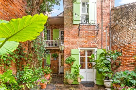 Post Image New Orleans Apartment, 1940s Bungalow, Brick Courtyard, Green Shutters, Bungalow Style, Bourbon Street, Wooden Ceilings, Affordable Decor, Beach Bungalows