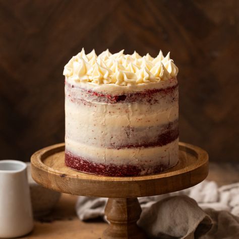 Naked red velvet cake is moist with a mild chocolate flavor and vibrant red color! It's lightly frosted with classic cream cheese frosting. Red Velvet Naked Cake, Red Velvet Drip Cake, Naked Red Velvet Cake, Red Theme Cake, Naked Cake Recipe, Red Velvet Birthday Cake, Cream Cheese Frosting Cake, Naked Cakes, Cake Carrier