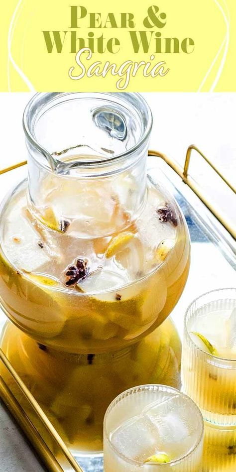 This Pear and White Wine Sangria is what you need for your holiday parties! Make it ahead and let guests serve themselves. It's made with pear nectar, white wine, ginger beer, and warm holiday spices. Cheers! #sangria #holiday #christmas #party #simplyrecipes Pear Sangria, Sangria White, Pear Nectar, Holiday Drinks Alcohol, White Wine Sangria, Wine Sangria, Gluten Free Beer, White Sangria, White Wines