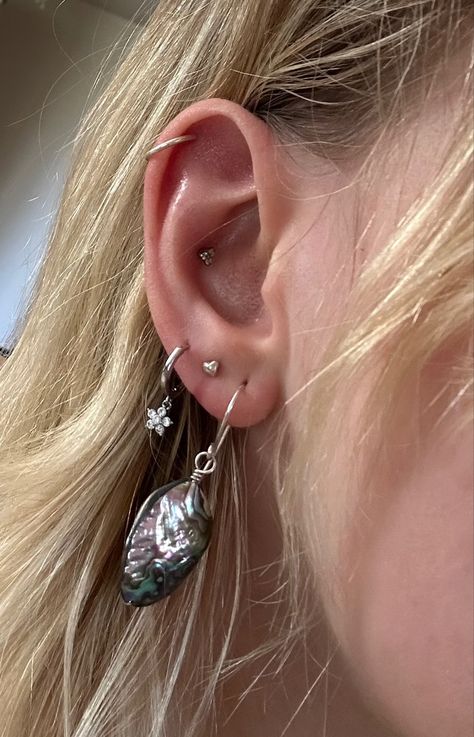 Earring Styling Silver, Silver Earring Stack Prom, Earrings Stack Aesthetic, Ear Style Silver, Three Lobe Piercings Silver, Multiple Ear Piercings Aesthetic Silver, Ear Styling Ideas Silver, Ear Piercings Sliver, Silver Earring Combinations