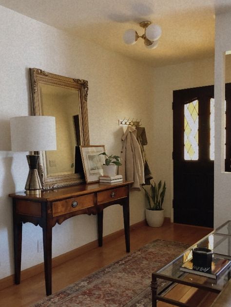 Front entryway styling—vintage Baker burl wood console table, ornate gold mirror, stained glass door Antique Wood Console Table, Vintage Console Table Decor, Entryway Table Mirror, Entry Way Mirror Ideas, Entryway Table With Mirror, Vintage Entryway Table, Entry Table With Mirror, Burl Wood Console Table, Style An Entryway