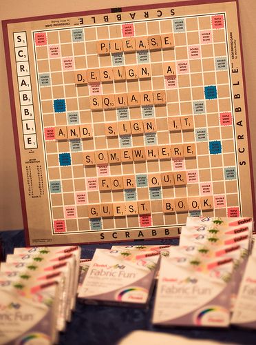 9 awesome ways to add Scrabble to your wedding day | Offbeat Bride Guest Book Instructions, Board Game Wedding, Scrabble Wedding, Scrabble Crafts, Scrabble Board, Unique Guest Book, Wedding Mementos, Lets See, Offbeat Bride