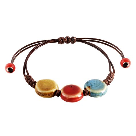 PRICES MAY VARY. VIBRANT HANDCRAFTED CERAMIC BEADS: Each bead on this bohemian bracelet is crafted from ceramic and uniquely colored, offering a vibrant spectrum from earthy greens to sunny yellows, making it a standout accessory. ADJUSTABLE LEATHER CORD: The robust leather cord is designed for longevity and comfort, featuring an adjustable knot that allows for a customized fit for any wrist size. PERFECT FOR LAYERING OR SOLO WEAR: Whether worn alone for a subtle hint of color or layered with ot Boho Cuff Bracelet Hippie Bohemian, Cute Bracelets To Make, Leather Macrame, Leather Cord Jewelry, Ceramic Bead Jewelry, Leather Beads, Earthy Greens, Ceramic Bracelet, Boho Cuff Bracelet