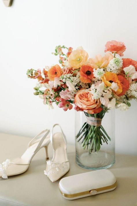 Peach And Cream Wedding Bouquet, Burnt Orange Wedding Arch Flowers, Peachy Orange Wedding Flowers, April Bouquet Wedding, Pastel Fall Wedding Flowers, Bridal Bouquet With Ranunculus, Coral Pink Bouquet, Peach And Yellow Wedding Decor, Coral Peony Wedding Bouquet