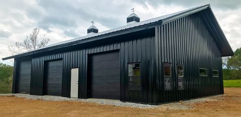 Outdoor Metal Building Ideas, Black Morton Building, Metal Building Salon, 30x40 Garage With Living Quarters, Metal Building Garage Shops, Black Steel Building, Black Pole Building, Commercial Metal Building Exterior, Black Metal Garage Buildings