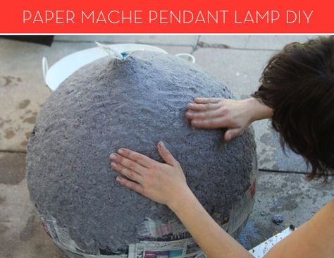 How To: Make a Modern Paper Mache Lamp  Remember back in the day when you made those paper mache masks and impressed all your elementary school friends? Well, paper mache is growing up (in a big way) with today's DIY lamp idea. Paper Mache Lamp, Mascara Papel Mache, Diy Pendant Lamp, Diy Luminaire, Paper Mache Projects, Paper Mache Mask, Make A Lamp, Paper Mache Clay, Diy Lampe