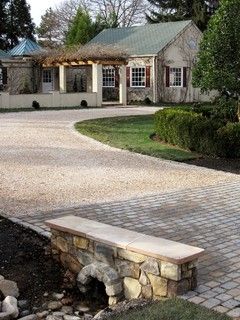 75 Traditional Landscaping Ideas You'll Love - May, 2024 | Houzz Stone Culvert, Culverts Ideas, Elegant Driveway, Driveway Culvert, Driveway Apron, Traditional Landscaping, Driveway Entrance Landscaping, Stepping Stone Walkways, Stone Garden Paths