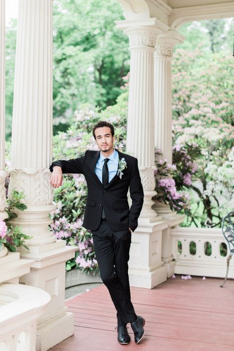 groom in black suit and light blue shirt Black Suit And Light Blue Tie, Black Suit Light Blue Shirt Men, Dusty Blue Tie Black Suit, Black Suit Light Blue Tie, Blue Shirt Black Suit, Black Suit With Blue Shirt, Black Suit Blue Shirt, Peach And Blue Wedding, Blue Black Suit