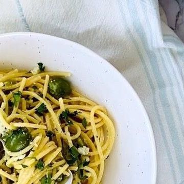 Undeniably Dairy on Instagram: "Dirty Martini Pasta? 🫒🍸🍝 Say less. 👉This week, let’s take a break from the mundane and make something special: Dirty Martini Pasta! Ready in no time⏰, it’ll add just the perfect zest to get us through the day. #PastaTime #dinnerideas Ingredients: 2 tablespoons extra virgin olive oil 1 cup pitted castelvetrano olives, jarred, plus 1/3 cup olive brine 4 cloves garlic cloves, minced 1 lemon, zested 1/3 cup vodka 1 pound spaghetti, cooked al dente 2/3 cup heavy cream 3 tablespoons unsalted butter 2/3 cup parmesan cheese, plus more for serving 1/3 cup parsley, fresh and chopped 1/4 cup crumbled blue cheese Instructions: 1. Sauté garlic in olive oil in a large skillet over medium heat. Add olives, lemon zest and vodka and cook, stirring frequently, until fragr Dirty Martini Pasta, Undeniably Dairy, Martini Pasta, Garlic In Olive Oil, Castelvetrano Olives, Olive Brine, Say Less, Homemade Laundry, The Mundane