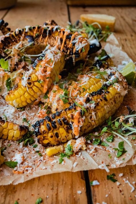 Elote style grilled corn ribs served with Mexican crema, spicy aioli, chopped cilantro, tajin and parmesan cheese. Mexican Corn Ribs, Corn Ribs Recipe, Bbq Spread, Mexican Style Corn, Corn Ribs, Grilled Kabob Recipes, Vegetarian Ideas, Spicy Aioli, Grilling Kabobs