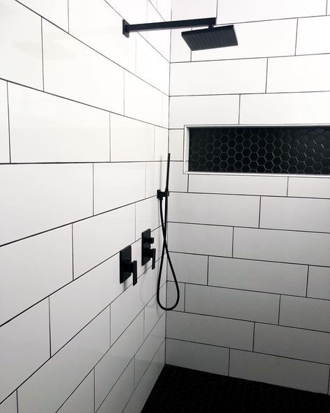 Large Scale Subway Tile Bathroom, Large White Tiles With Black Grout, White Marble Shower Tile Black Floor, White Shower Tile With Black Accent, Subway Tile Shower Black Grout, White Marble Tile With Black Grout, White Subway Tile Shower With Black Grout, Bathroom Tiles With Black Grout, Large White Tile Black Grout