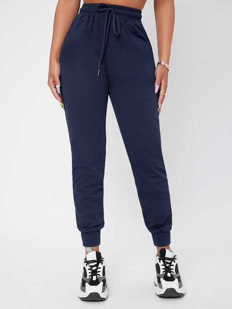 Solid Drawstring Waist Sweatpants Navy Blue    Fabric Plain Jogger Slight Stretch All Women Clothing, size features are:Bust: ,Length: ,Sleeve Length: Cheap Blue Casual Joggers, Cheap Blue Jogging Bottoms, Casual Blue Sweatpants For Training, Casual Blue High-waisted Sweatpants, Cheap Blue Joggers, Dark Blue Sweatpants, Pocket Sweatpants, Blue Sweatpants, Blue Joggers