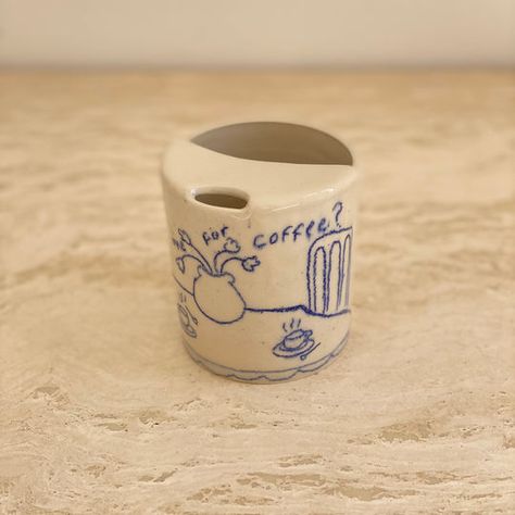 Preorders for the “meet me for coffee?” keep in mind these will take up to two months to produce and have them at your door step!  around 300-320ml  This mug is made from high-quality stoneware clay, built using the wheel, wedged, illustrated, and coated with a glossy transparent glaze. Handwashing is preferred. note: Ceramic Coffee Tumbler, Ceramic Keep Cup, Ceramic To Go Mug, Ceramics Cup Ideas, Ceramic Cup Ideas, Pottery Mug Ideas, Pottery Tattoo, Pottery Tumblers, Ceramic Gift Ideas