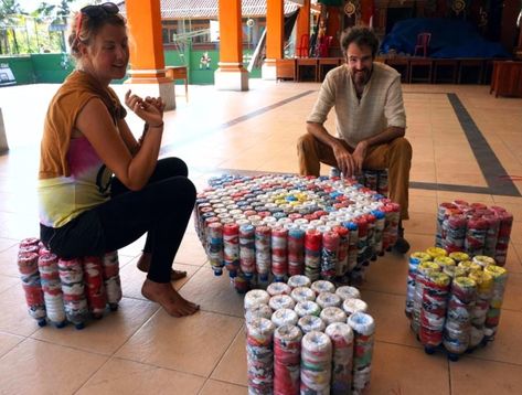 A man and a woman sit on furniture made out of ecobricks Brick Projects, Eco Furniture, Reuse Plastic Bottles, Diy Plastic Bottle, Plastic Trash, Plastic Bottle Crafts, Eco Living, Recycled Projects, Kitchen Decorating