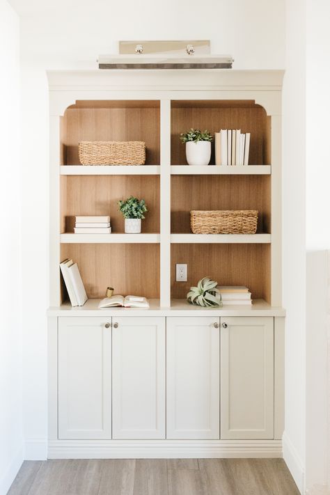 White Bookcase With Doors, Closet To Built In Shelves, Bookcase In Hallway, Off White Built Ins, White And Wood Bookshelf, Custom Built In Bookcase, 2 Tone Built In Bookshelves, Cream Built In Bookshelves, White And Wood Built Ins