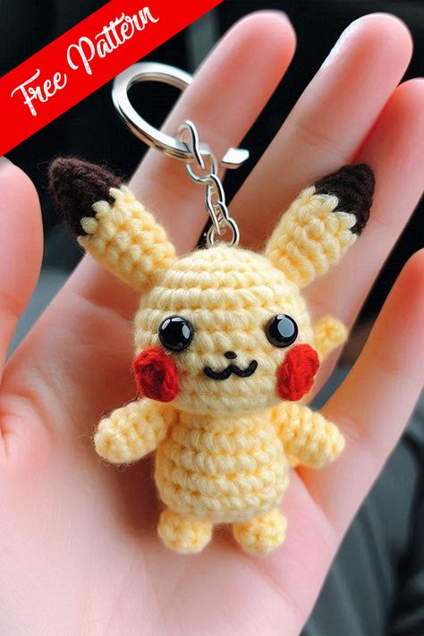 This delightful crocheted Pikachu keychain captures the essence of one of the most beloved Pokémon characters in a fun and fashionable accessory. Disney Free Crochet Patterns, Pikachu Crochet Pattern Free, Crochet Toys For Beginners, Crocheted Pikachu, Crochet Disney Characters, Crochet Keychain Pattern Free Easy, Crochet Keychain Free Pattern, Mini Crochet Animals, Pikachu Keychain