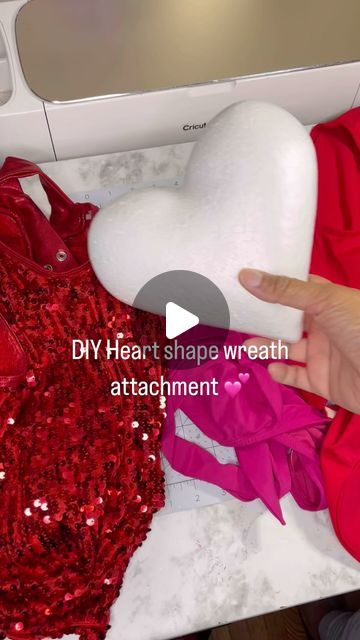 Latoya | Holiday Decor•Party Decor•DIY on Instagram: "Take this as your sign to order your Valentine’s Day wreath from this Coilygirl💁🏾‍♀️
.
.💕 DIY heart-shaped wreath attachment💕.
.
As you requested we are gearing up for Valentine’s Day and of course we have to get started on a few DIY’s for the new season. I used a foam heart from @dollar tree and some scrap materials I had in my stash. 
.
.
Now that bathing suit 👀 it was thrown in the fabric bin bc the wrong size was grabbed but it was to late to take it back but shout out to @jcpenney for their clearance deals bc it was only $10/$15….we gonna use that pink on another attachment 💁🏽‍♀️.
.
Drop a ❤️ in the comments if the finished product is giving you the #valentines day feels💕.
.
.
#diy #valentinesdaywreath #wreath #decor #sequi Heart Shaped Wreaths, Diy Heart, Take It Back, Scrap Material, Fabric Bins, Diy Party Decorations, Wreath Decor, Dollar Tree, Shout Out