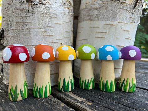 These cute wooden mushrooms are hand painted making them each unique. They are a great addition to any open-ended playing, hands-on activities and perfect to let their imagination go wild with stories and conversations. They can also be a fun home decoration for mushroom lovers. Also perfect for fairy and gnome gardens and any forest magical playing, woodland forest, hands-on and great for sensory bins. And of course a cute idea for this holiday season or birthday baskets! They can be a great addition to a lot of my play mats I have on my Etsy shop as well. My brother and I had mostly natural toys and handmade things that my mom made for us. And also learned to make things and craft since we were little. I grew up making things and now that I am older I love making these and my other toys Painting Wooden Mushrooms, Painted Wood Mushrooms, Painted Wooden Mushrooms, Mushroom Things, Gnome Forest, Birthday Baskets, Painted Mushrooms, Forest Magical, Pottery Idea