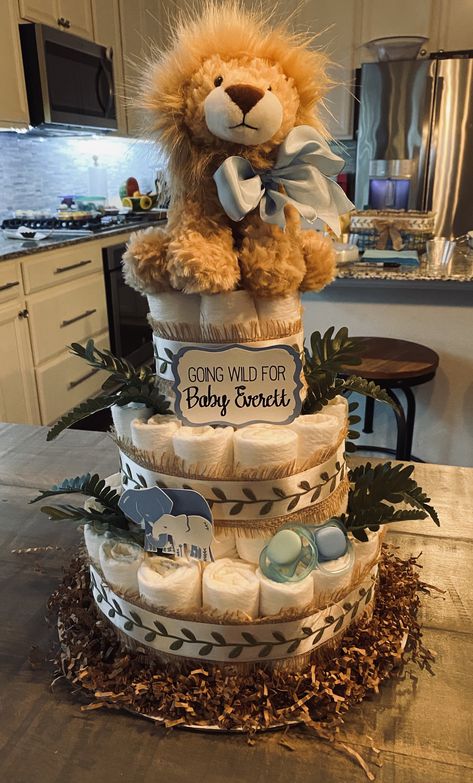 Safari Theme Diaper Cake, Safari Diaper Cake Boy, Zoo Baby Shower Ideas, Lion Theme Baby Shower Ideas, Wild Baby Shower Theme, Lion Baby Shower Ideas, Lion King Diaper Cake, Lion Baby Shower Theme, Jungle Diaper Cake