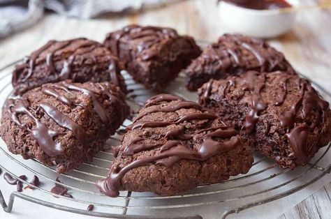 Triple Chocolate Scones | King Arthur Baking: These scones feature chocolate chips studded within a tender, just-sweet-enough chocolate scone; the rich chocolate glaze on top is a bonus. Chocolate Scones Recipe, Cinnamon Scones, Chocolate Scones, Orange Scones, King Arthur Baking, Scones Recipe, King Food, King Arthur Flour, Pastry Blender