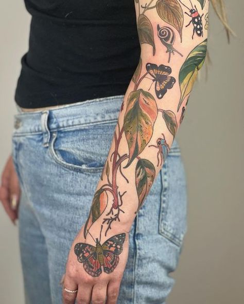 Bugs Sleeve Tattoo, Feminine Garden Tattoo, Bug Flower Tattoo, Plant Tattoos Color, Insect Leg Sleeve, Plant And Bug Tattoo Sleeve, Knee Plant Tattoo, Garden Themed Tattoos, Flower And Bug Tattoo Sleeve