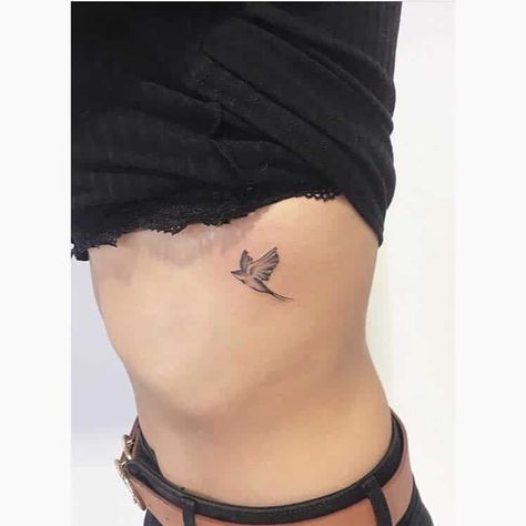 Top 61 Best Small Bird Tattoo Ideas - [2021 Inspiration Guide] Bird Tattoo Side Ribs, Bird Rib Tattoos For Women, Bird Tattoo On Ribs, Bird Rib Tattoo, Small Bird Tattoo Ideas, Mockingbird Tattoo, Bird Tattoo Ideas, Bird Tattoo Ribs, Swallow Tattoos