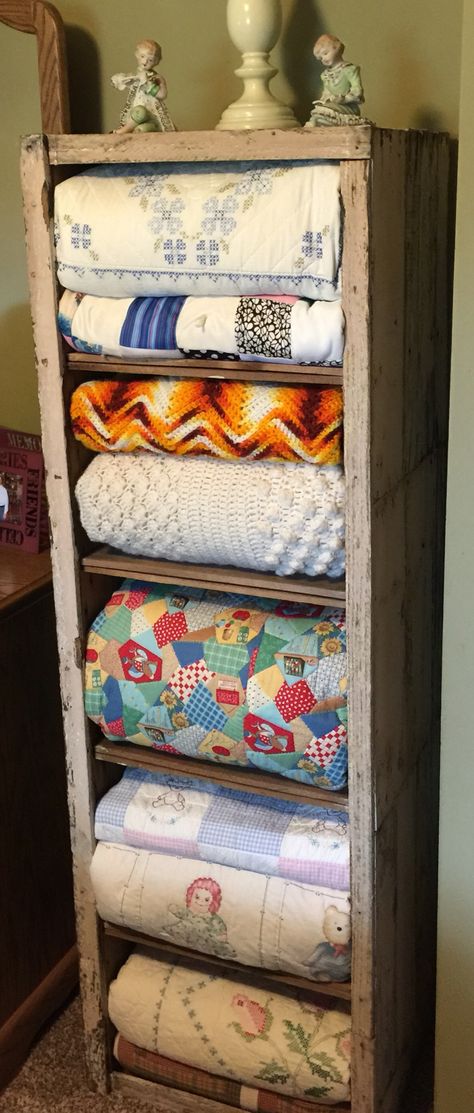 How To Display Quilts On Wall, Afghan Storage Ideas, Crochet Blanket Display Ideas, How To Display Afghans, Quilt Shelf Rack Display, Afghan Display Ideas, Heirloom Display Ideas, How To Display Old Quilts, Vintage Quilt Display Ideas