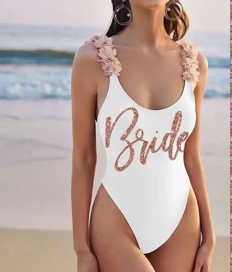 Going somewhere warm and tropical for your bachelorette party? Be sure to get a swimsuit that will make you stand out at the beach or pool! Our gorgeous bathing suits are made by a small business right here in the USA! Bathing Suit Bachelorette Party, Honeymoon Bathing Suit, Bride Swimsuit, Bride Bathing Suit, Honeymoon Swimsuit, Bridal Swimsuit, Bridal Swimwear, Tropical Bachelorette Party, Rose Gold Bride