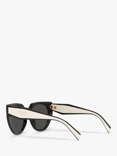 This pair of cat's eye shaped sunglasses by Prada is designed to suit a rectangular-shaped face. The polyamide lenses are impact resistant and lightweight for comfortable wear, repelling water and dust for higher clarity. Prada Cat Eye Sunglasses, Black Cat Eye Sunglasses, Shaped Sunglasses, Prada Sunglasses, Dream Design, Eye Shapes, Women's Sunglasses, Designer Sunglasses, Christmas List