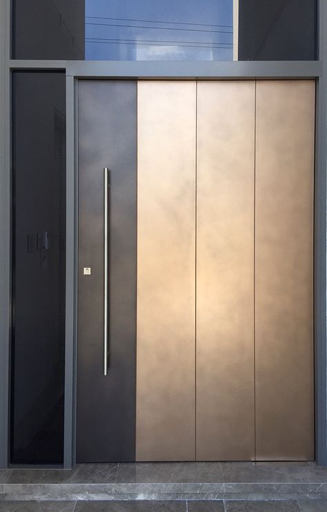 PEARL BRONZE - beautifully handcrafted in India , a sophisticated blend of Bronze and Bronze with two different shades. Explore the bespoke design of contemprory metal doors which are handcrafted in India by the staff that loves what they do #maindoor designs #maindoor ideas #metal main door designs #luxury main doors #bespoke metal door designs #aluminrdoors Interior Design Blogs, Modern Entrance Door, Metal Doors Design, Contemporary Front Doors, Luxury Door, Entrance Door Design, Door Design Modern, Main Door Design, Pivot Doors