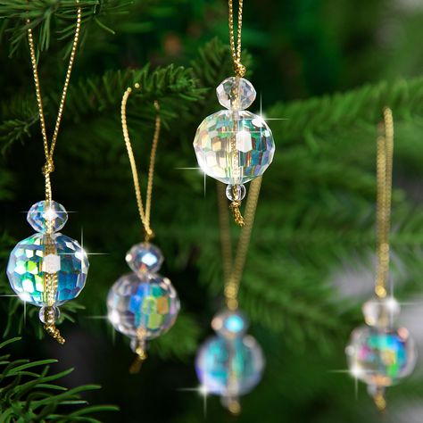 PRICES MAY VARY. Quality Material: The crystal glass Christmas balls ornaments are made of glass, which are smooth, texture, durable, not easy deformation. Glass products, so it will need to be treat carefully. Colorful: The mini colorful prism balls will appear in different colors when reflected by sunlight and light, romantic, clear and bright, which is the first choice for decoration. Easy to Use: The crystal hanging balls come with lanyard, you can hang them anywhere you want to decorate. Li Hanging Crystals Diy, Christmas Tree Wedding, Ornaments For Christmas Tree, Glass Christmas Balls, Ornaments For Christmas, Crystal Balls, Glass Ball Ornaments, Glass Balls, Hanging Crystals