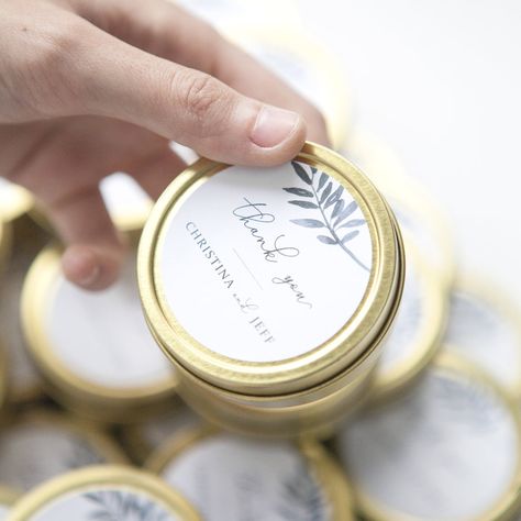 How to Give Custom Candles as Wedding Favors | custom candles for wedding favors Wedding Favor Candles, Popular Candle, Daisy Logo, Custom Label Design, Candles Unique, Popular Candles, Bulk Party Favors, Tea Package, Candle Tins