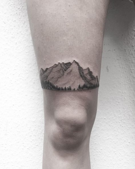 Incredibly detailed, dot-work style mountains and trees tattoo inked above the right knee Watercolor Mountains Tattoo, Trees Tattoo, Small Mountain Tattoo, Mountain Tattoos, Tattoo On Thigh, Related Tattoos, Mountain Tattoo Design, Mountains And Trees, Geometric Mountain