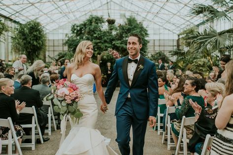 Waters gown and Navy tuxedo at Gold, Pink and Teal Greenhouse wedding at Philadelphia Horticulture Center via M2 Photography Teal Tuxedo For Men, Teal Wedding Suit Groom, Dark Teal Tuxedo Wedding, Dark Teal Groom Suit, Dark Teal Tuxedo, Dark Teal Boutonniere, Teal Tuxedo, Navy Tuxedo, Teal Suit