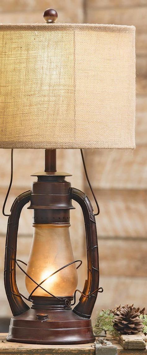 Rustic Vintage Lamp: Light up your rustic home with the Lauren Table Lamp. This lamp adds beauty and character with the look of a vintage lantern. #rusticlighting #rusticlamp #rusticstyle #rustic Cabin Lamps, Lantern Table Lamp, Buffet Table Lamps, Rustic Table Lamps, Black Forest Decor, Lamp Makeover, Cabin Lighting, Table Lamps Living Room, Forest Decor