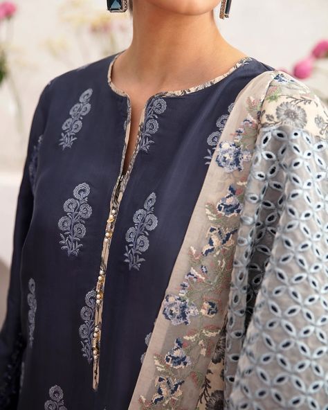 Ethnic boutique collection,A classically chic composition is layered over this exquisite ensemble rendered in an appealing indigo blue shade. It depicts a contemporary shirt enriched with intricate embroidery with beautiful floral designs in refreshing shades of blue. Paired with a classy trouser adorned with delicate embroidery at bottom opening and a gracefully draped embroidered dupatta with aesthetically rich designs, this resplendent outfit is a style statement for happening occasions th... Indigo Embroidery, Classy Trousers, Embroidery Kurta, Hand Beaded Embroidery, Delicate Embroidery, Indigo Colour, Embroidered Dupatta, Boutique Collection, Intricate Embroidery