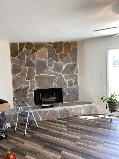 Gray Wash Stone Fireplace, White Wash River Rock Fireplace, White Wash Large Stone Fireplace, Grey Painted Rock Fireplace, Painting A Rock Fireplace Gray, Flagstone Fireplace, Whitewash Stone Fireplace, Dark Wood Floors Living Room, Laminate Plank Flooring