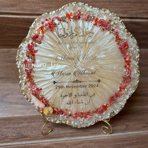 “Turn a special day into a memory that lasts forever.” ✨ and Celebrate love with a timeless gift . This wedding season, give a gift to your loved ones which is as one-of-a-kind as their love—handcrafted resin art couple frames with a personal touch. We create keepsakes that last a lifetime. . A perfect gift for any occasion, whether it’s a wedding or anniversary. Order now and make their moments timeless! #weddinggifts #CoupleFrame #AnniversaryGift #PersonalizedGifts #ResinArt #tabledecor... Resin Wedding Gifts, Raisin Art, Resin Wedding, Art Couple, Resin Design, Celebrate Love, Diy Resin Crafts, Timeless Gifts, Couple Art