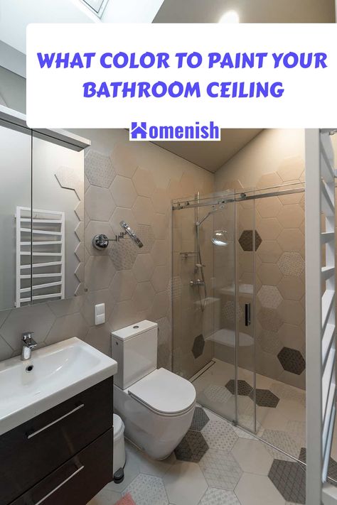 When it comes to bathroom design, the ceiling color is often overlooked. However, it plays a crucial role in the room's atmosphere. This article suggests eight color options to consider that can enhance your bathroom's visual appeal. Bathroom With Coloured Ceiling, Painting Bathroom Ceiling Dark, Bathroom Ceiling Paint Ideas, Bathroom Ceiling Color Ideas, Painted Bathroom Ceiling Ideas, Ceiling Colors For White Walls, Painting Bathroom Ceiling, Small Bathroom Ceiling Ideas, Bathroom Painted Ceiling