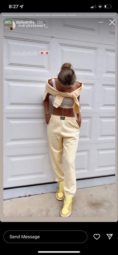 Cute casual look: pale yellow matching sweat set with sweatshirt tied around shoulders. Paired with Jordan’s. Sweatshirt Tied Around Shoulders, Daily Drills, Matching Sweat Set, Running Style, Sweat Set, Running Fashion, Current Trends, Pastel Yellow, Yellow Fashion