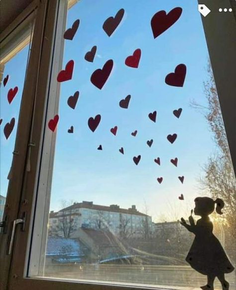 Valentines day craft. Decorating Window craft ideas. Girl blowing heart in window. Diy Valentines Window Decorations, Valentine Window Decorations, Valentine’s Day Window Decor, Daycare Window Ideas, Valentine Window Painting Ideas, Valentines Day Window Decorations, Valentine’s Day Window Painting, February Window Display, Window Craft Ideas