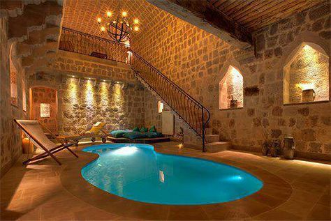 For my future castle... a dungeon pool, with a chandler suspended above it. Indoor Swimming Pool Design, Indoor Pool Design, Piscina Interior, Indoor Pools, Indoor Swimming Pool, Decor Ikea, Pool Rooms, Dream Pools, Beautiful Pools