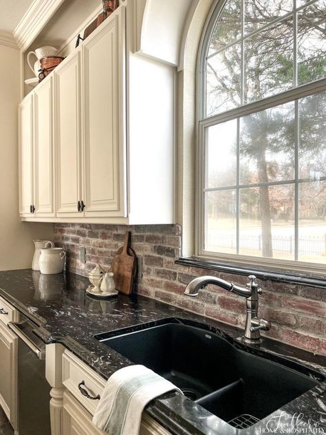 Black Brown Countertops Kitchen, Brick Backsplash With Black Countertops, Backsplash Black Granite, White Cabinets Black Granite, Black Granite Countertops Kitchen, Modern French Country Kitchen, Kitchen Black Counter, Redo Kitchen, French Country Kitchen Cabinets