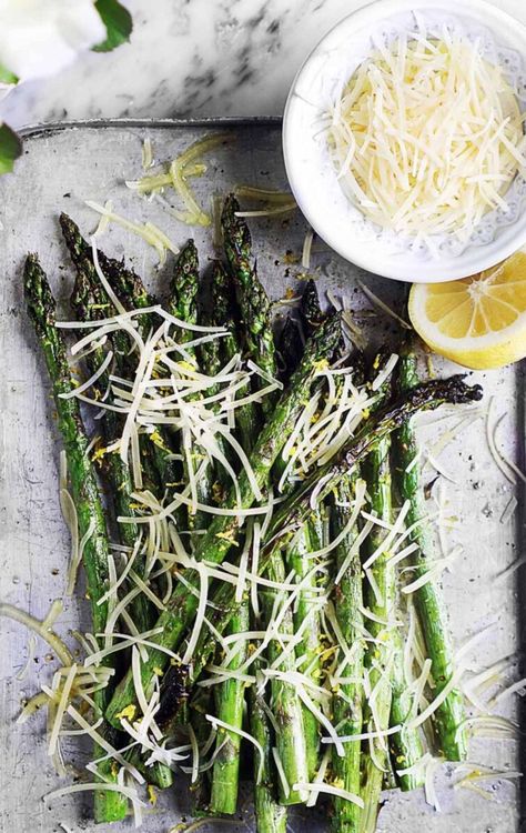 These Grilled Asparagus are crispy on the outside and loaded with zesty flavors and parmesan cheese. Easy and delicious, they’re a sure-fire cookout hit! Grilled Veggies Recipes, Parmesan Asparagus, Bacon Wrapped Asparagus, Vegan Parmesan Cheese, Parmesan Recipes, Side Dishes Recipes, Vegan Parmesan, Fresh Asparagus, Colorful Salads