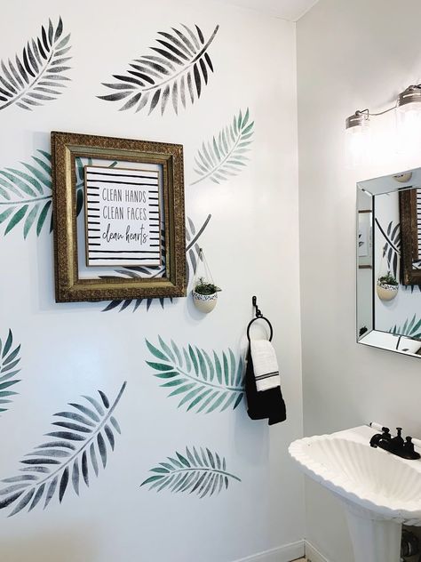 Looking for a cheap and quick way to update your bathroom? check out the before and after photos of this cute makeover on a budget. This idea is perfect for a rental apartment home, is simple but makes a huge change. #diy #bathroom #makeover Easy Bathroom Makeover, Leaf Wall Stencil, Accent Wall Stencil, Funky Wallpaper, Tree Branch Wall, Bathroom Accent Wall, Ombre Wall, Leaf Stencil, Painted Drawers