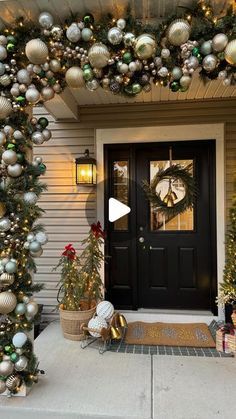 ##ChristmasDecor#HolidayHome#FestiveVibes#DeckTheHalls#TisTheSeason#ChristmasLights#WinterWonderland#ChristmasMagi#MerryAndBright#ChristmasInspiration Christmas Garland Porch Columns, Christmas Garland Columns, Christmas Garland Outdoor Pillars, Outside Door Garland, Gate Wreaths Entrance, Outside Arch Christmas Decor, Front Door Christmas Arch, Christmas Front Porch With Columns, Xmas Garland Around Front Door