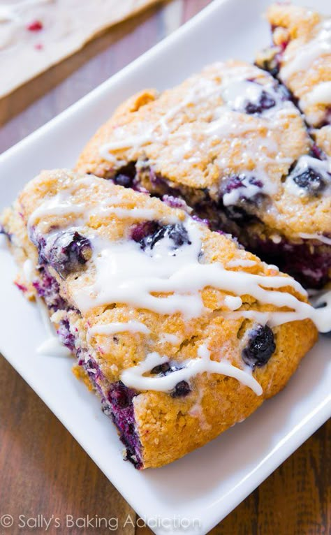 These are my favorite blueberry scones. Buttery and moist, each bite is packed with juicy blueberries and sweet vanilla glaze. Sallys Baking, Sally's Baking, Blueberry Scones, Raisin Cookies, Blueberry Recipes, Oatmeal Raisin, Scone Recipe, Köstliche Desserts, Breakfast Treats