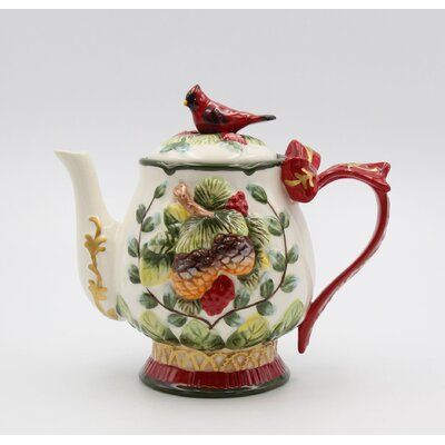 The Holiday Aisle® Ceramic Cardinal TeapotFeatures:Unique sculpted cardinal teapotHand-painted by the skilled workerHand wash onlyCardinal TeapotProduct Type: FigurineSubject: Nature;AnimalsFinish: White/RedPrimary Material: EarthenwareMaterial Details: Quantity: 1Hand Painted: YesHandmade: YesPurposeful Distressing Type: No DistressingLead Free: YesAge Group: AdultGlass Component: NoPower Source: Solar PoweredBattery Required: NoBattery Type: Number of Batteries Needed: Rechargeable Batteries: Tea Warmer, Elegant Vases, Tea Party Decorations, Robin Bird, Unique Sculptures, Cardinal Birds, Fine Ceramic, Porcelain Teapot, Holiday Red